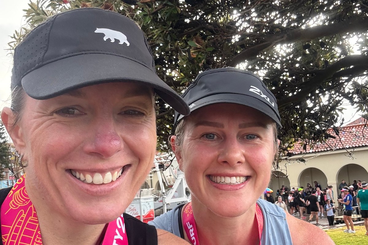 Ange and Sarah at Bondi Beach after finishing the City2Surf Ange and Sarah at Bondi Beach after finishing the City2Surf, wearing finisher medals