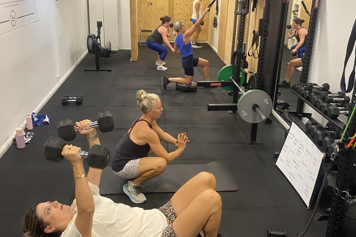 Personal trainer coaching a small group session for Randwick and Eastern Suburbs clients at The Fitness Space