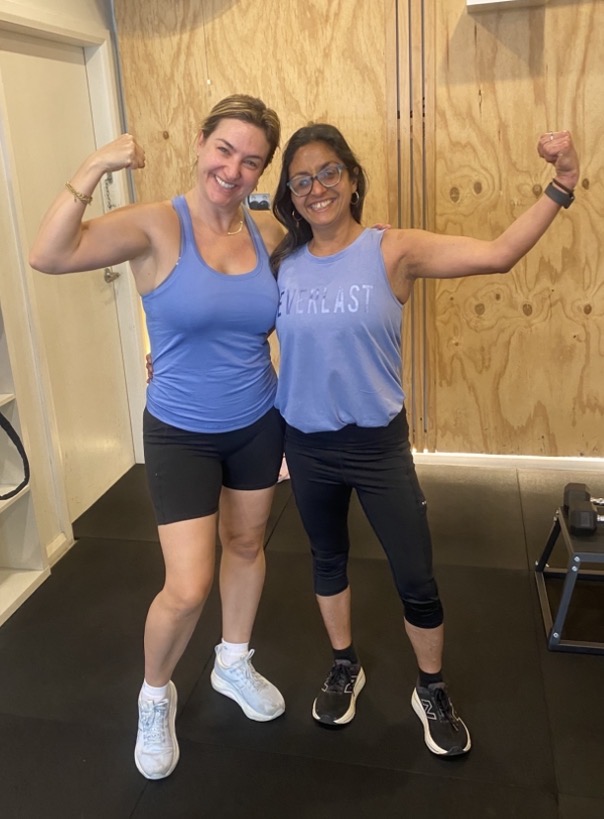 Short workouts: two clients after a session at The Fitness Space, Maroubra Two clients flexing their arms after a session at The Fitness Space studio in Maroubra