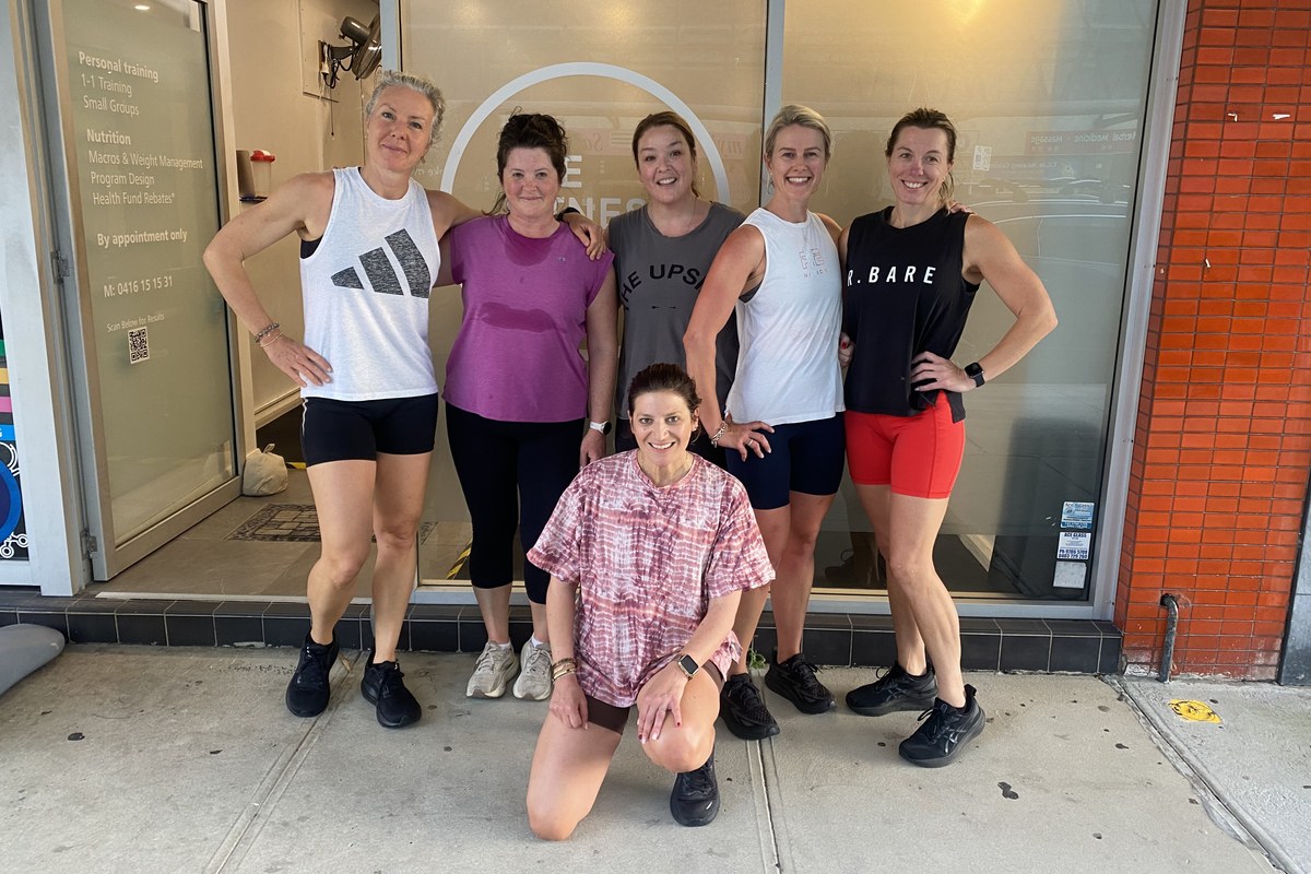 Small group training Maroubra: six clients outside The Fitness Space Six clients smiling outside The Fitness Space studio in Maroubra after a small group training session